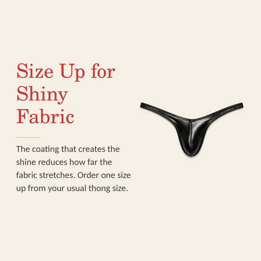 Metallic thong feature banner: size up for shiny fabric, since the coating reduces how far the fabric stretches