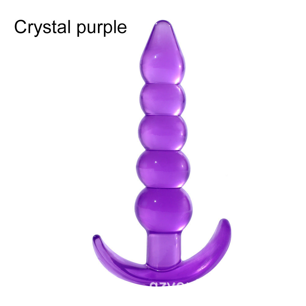 Silicone anal beads butt plug in translucent purple with five graduated beads and a curved T-base