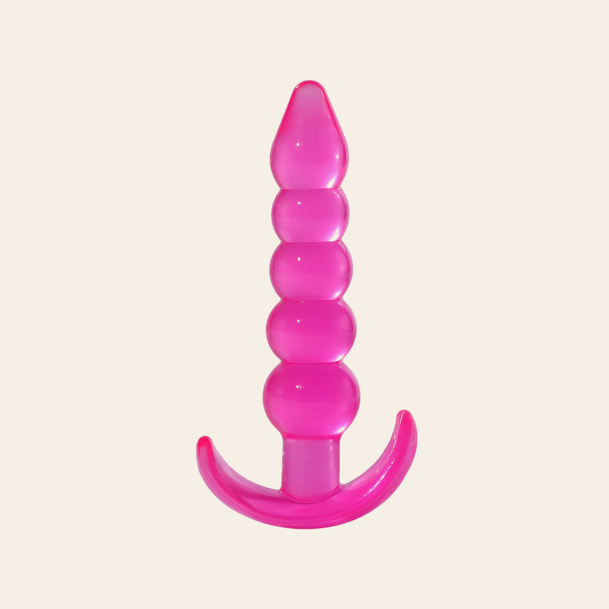 Translucent pink anal beads plug with five graduated beads and a curved T-bar base, on a soft beige background — Femme Bliss Anal Beads