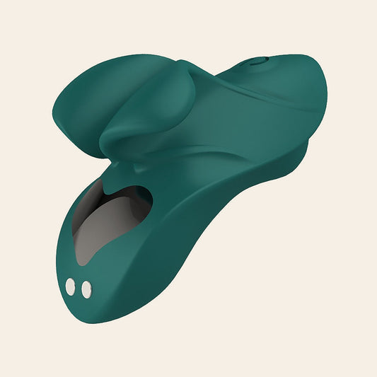 Dark teal silicone wearable couples vibrator with a sculpted body and control window, on a soft beige background — Femme Bliss Aqua Sensation