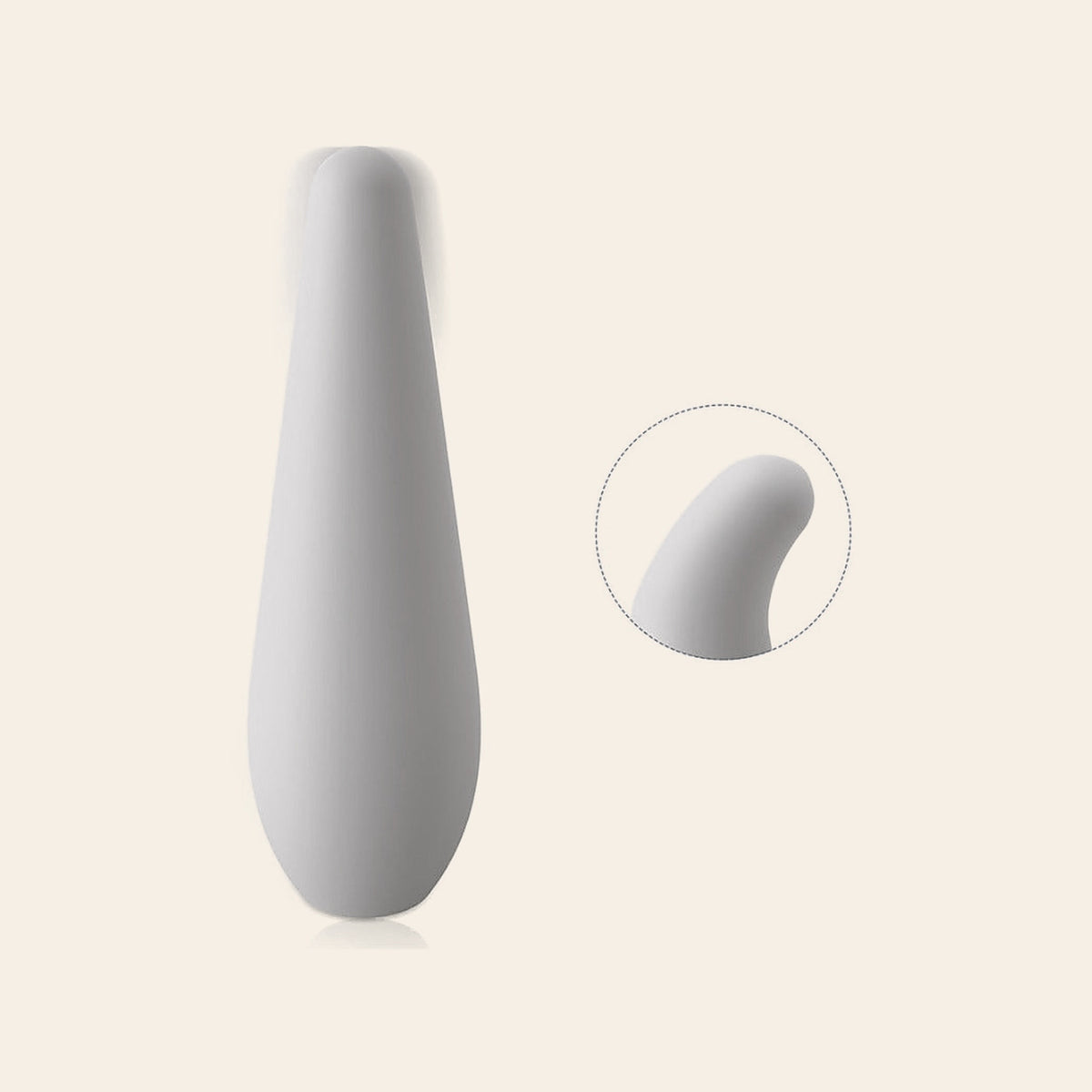 Light grey-white teardrop-shaped silicone vibrator with a soft curved tip, on a soft beige background — Femme Bliss Aqua Whisper