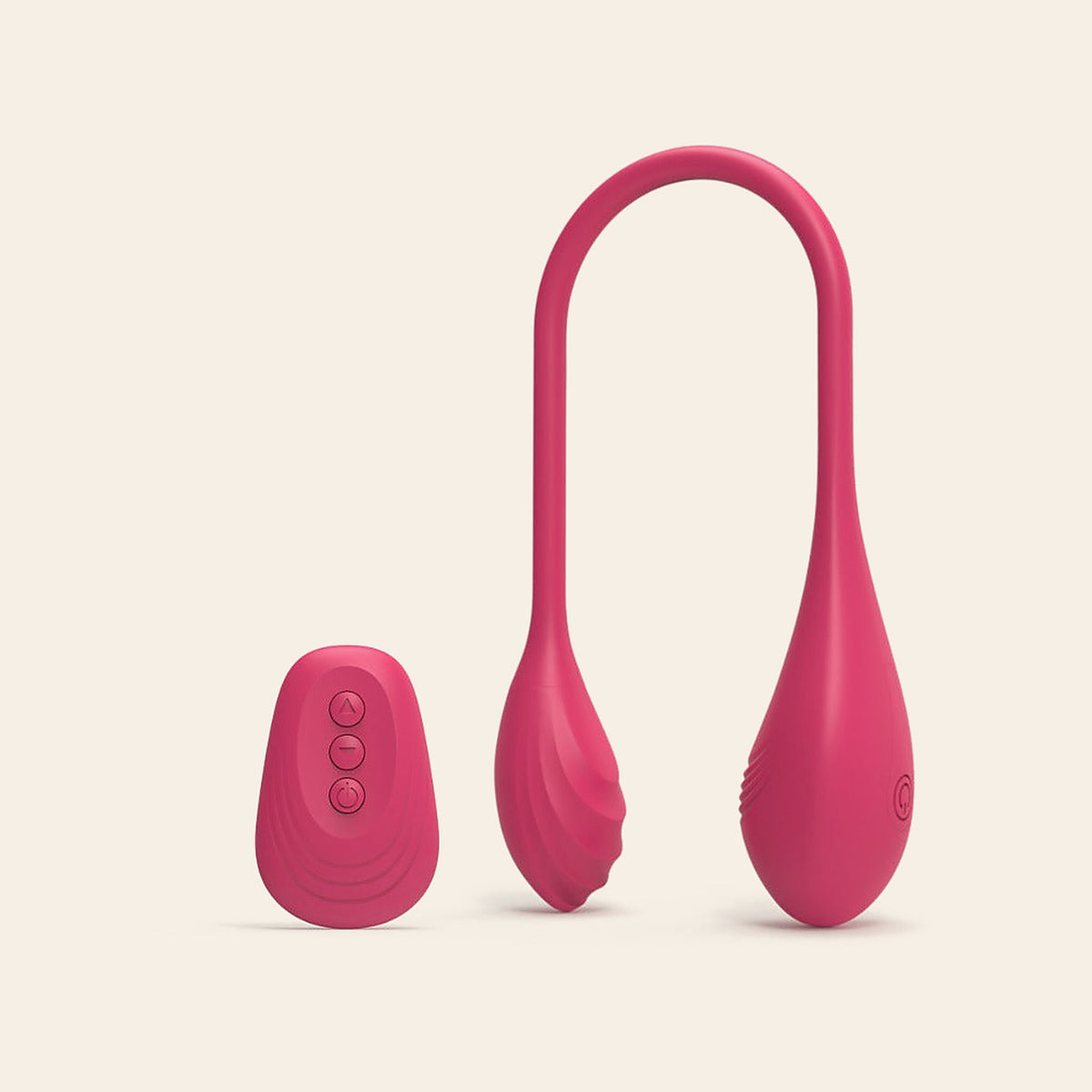 Rose red double-ended silicone vibrator with its flexible stem folded into a U, beside the wireless remote, on a soft beige background — Femme Bliss BlissFlex
