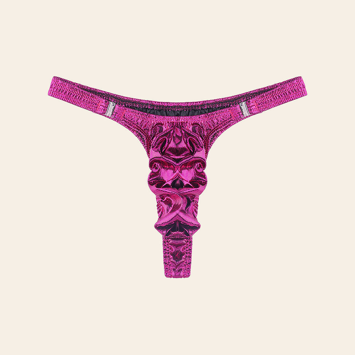 Men's high-shine metallic thong in fuchsia with a contoured pouch and slim side straps, on a soft beige background — Femme Bliss Lustre Edge