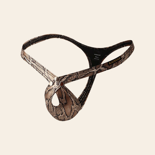 Men's low-rise thong in metallic snakeskin-effect fabric with a contoured pouch, on a soft beige background