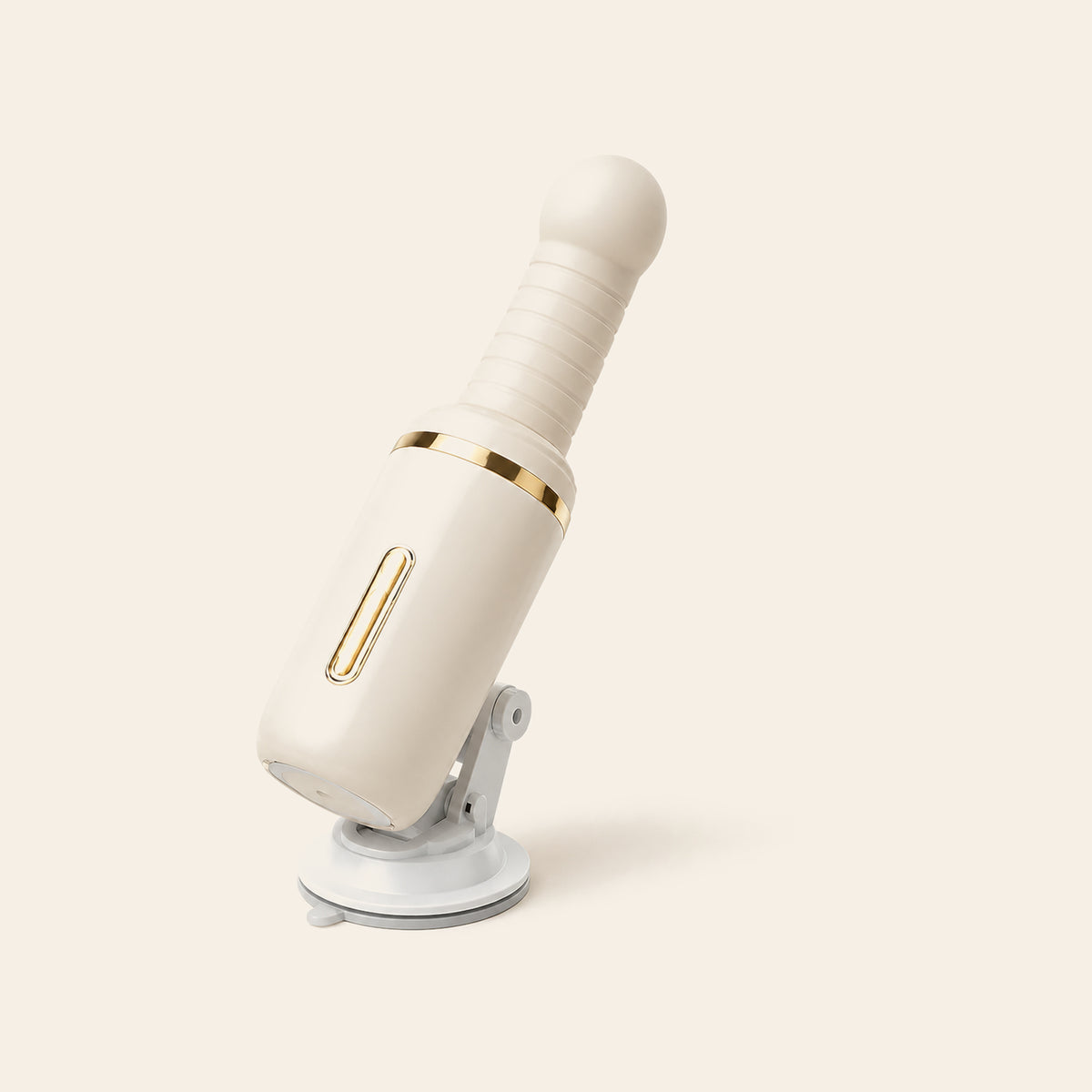 Cream auto-thrusting wand vibrator with ribbed shaft, gold accent ring and suction base on a soft beige background — Femme Bliss SteelBliss Pro